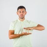 The Curious Reason Behind Men’s Long Thumb Nails